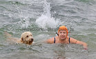Deirdre Connolly from Newbridge, Ballinasloe, with her Goldendoodle Lilly at Blackrock for their Christmas Day swim.