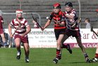 <br />
 Cappataggle's, Sean Garvey,<br />
 and<br />
 Rahoon-Salthill's, James Hurley and Michael Collins,<br />
 during the County Minor(B) Hurling Championship Final at Athenry.<br />
