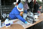 Snow is cleared from the table for serving tea and coffee at the East Galway Tractor Run 2018 at Athenry Mart on Sunday. Proceeds from the event will go to Hand in Hand which provides the families of children with cancer with much-needed practical support. 