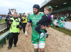 Connacht captain John Muldoon proudly carries his 4 year old niece, Emma Muldoon from Gortanumera, before his 300th appearance for the province at the Sportsground last saturday. Emma and Archie Naughton from Creggs were Connacht's mascots for the game.