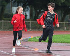 Réidín and Ciarán O'Driscoll from Hy-Brasil Court, Circular Road, taking part in the Goal Mile at Dangan on Christmas Day.