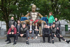 Gilgamesh and drummers performing before Macnas presented Gilgamesh, a 22-minute short film at the Town Hall Theatre last Sunday. <br />
Noeline Kavanagh, Artistic Director of Macnas, and Gilgamesh pictured with some of the team outside the Town Hall Theatre.