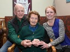 Bridie Daly with her daughter Maryanne Volk and her husband Bill Volk at her 106th birthday party in O'Meara's, Portumna