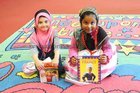 Marayan Pender and Rugaya Tasnim,  at the  Summer Reading Challenge presentations at Ballybane Library