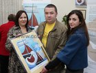 Pictured at the Cillin at Bearna Church for the launch of 'The Journey', prints of the late Chris Montague's painting in aid of children with Down's Syndrome in Galway were Judith Montague and her brother Conor and their cousin yvonne Gannon.