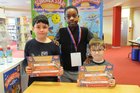 <br />
Ealean Gibbons, Tobi Oladimeeji and Isac Gibbons, received certificates,  at the  Summer Reading Challenge presentations at Ballybane Library